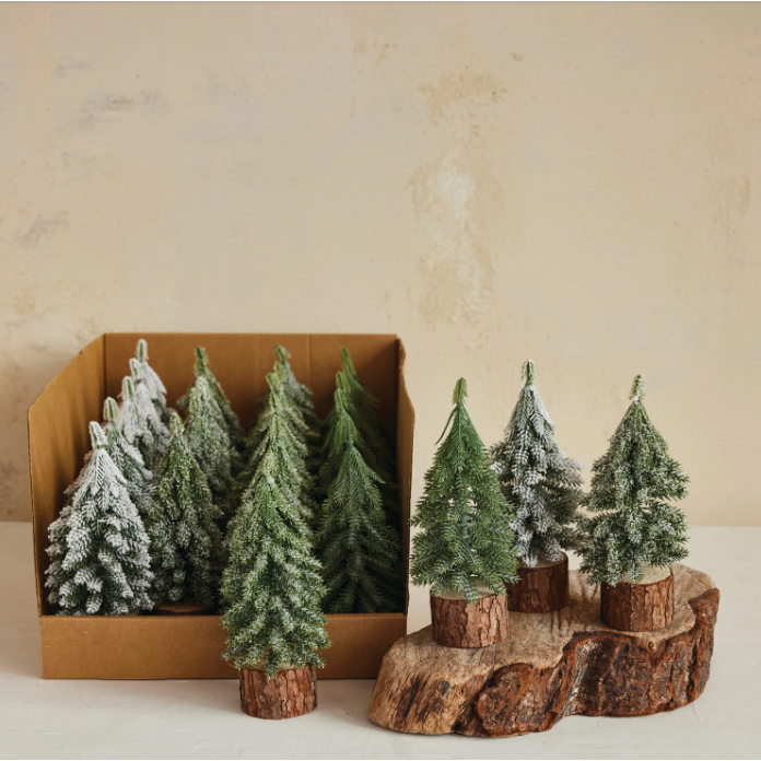 Evergreen Trees with Wood Slice Bases
